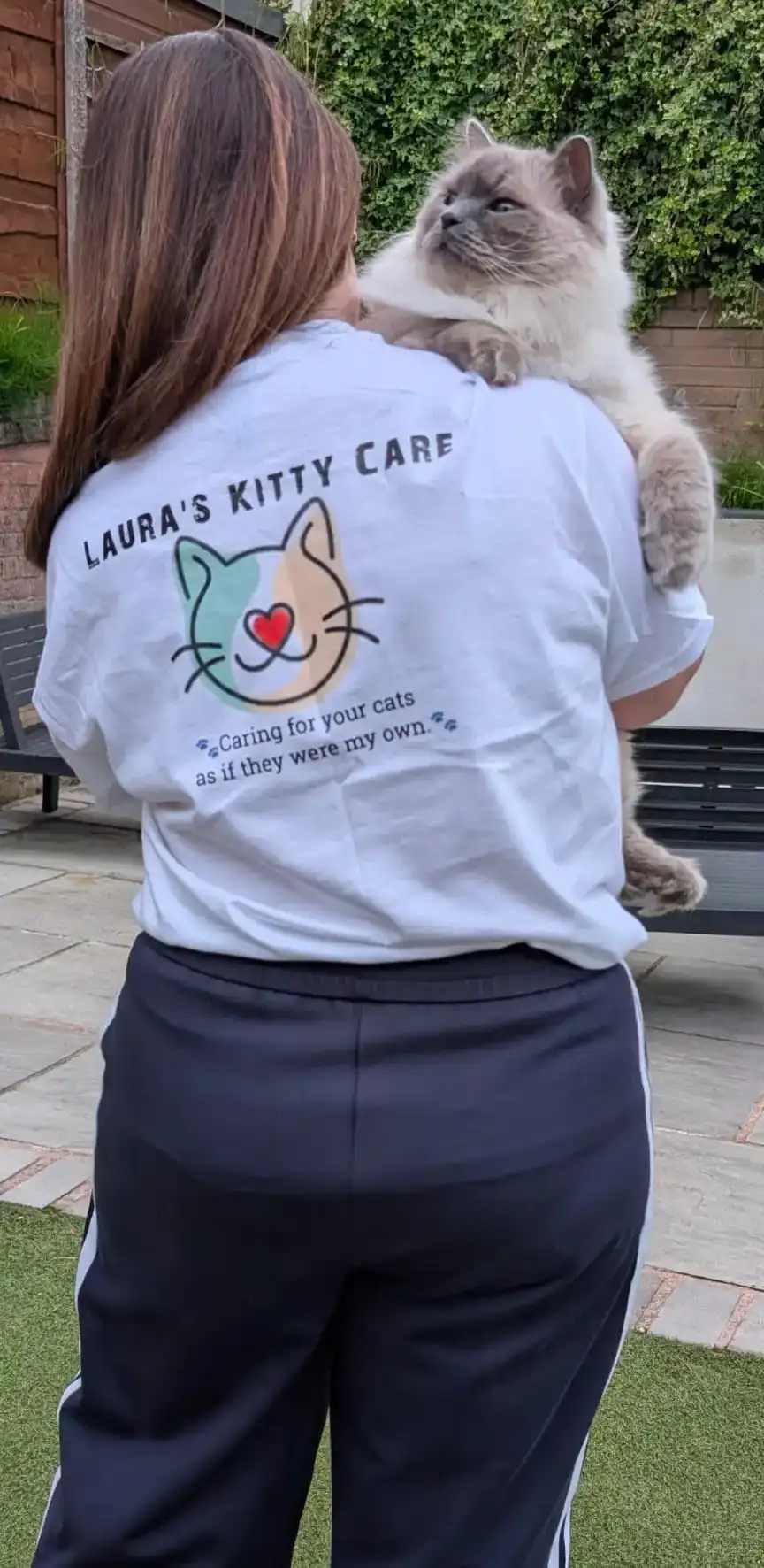 Laura with a tabby cat